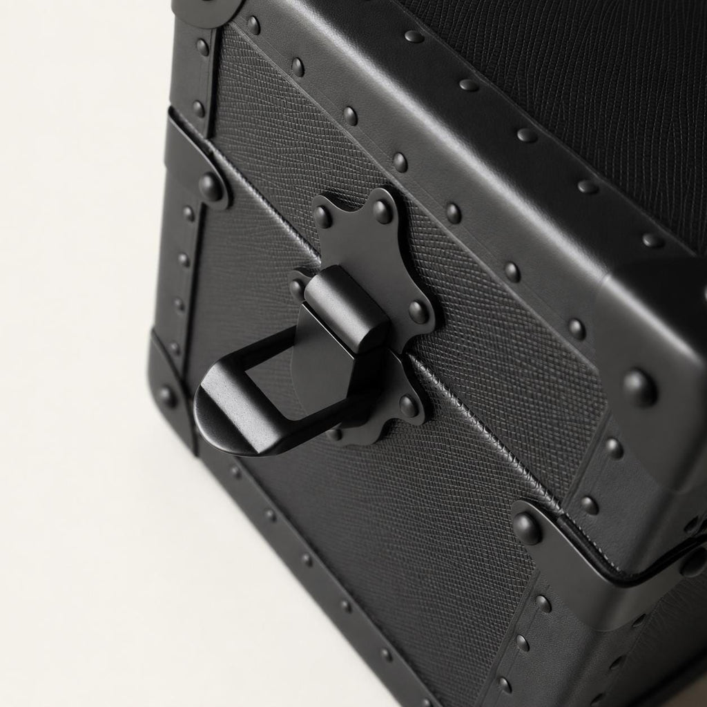 Lockable jewelry trunk with black finish and metal clasp