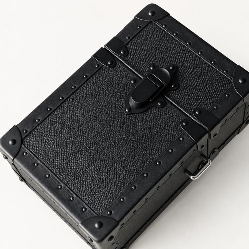 Black leather-wrapped wooden jewelry trunk, 120 x 180 x 70mm