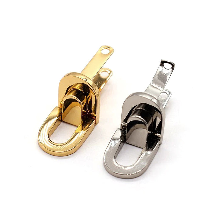 Handbag strap anchor showing rotating connector detail