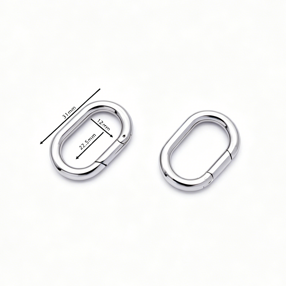 Close-up of oval spring ring opening mechanism in stainless steel